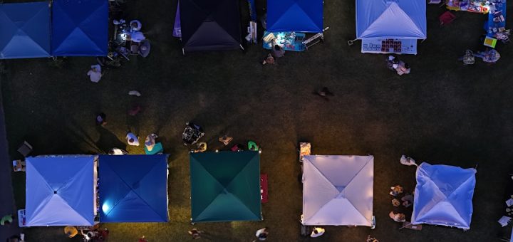An aerial view of a parking lot at night