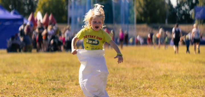 Child jumping in a sack race outdoors