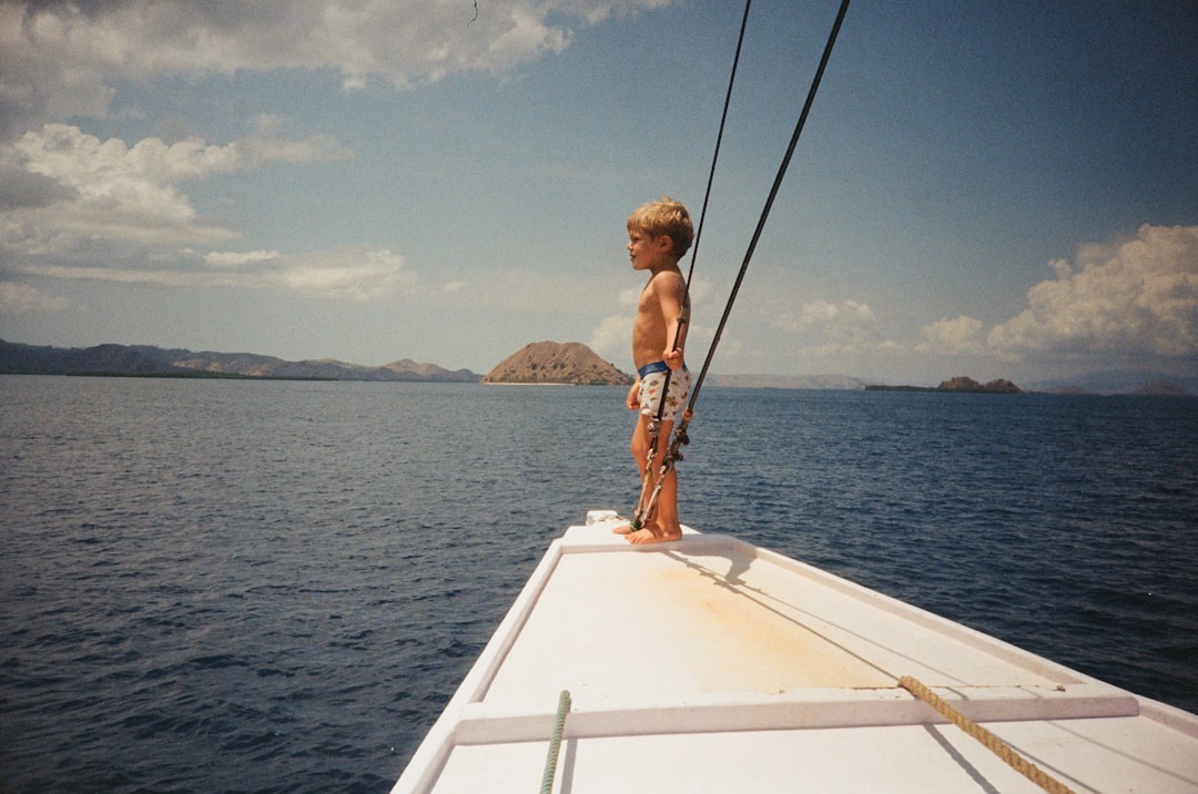 VMR 2026 Family Fishing Comp 1 woman in brown bikini sitting on white boat during daytime