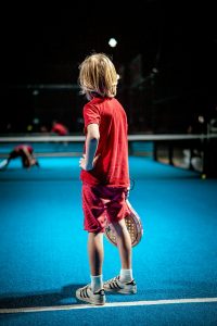 Serve Up Some Fun with Pickleball - A Free Holiday Activity for Kids in Childers 2 girl in red t-shirt and black pants running on blue floor